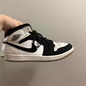 Nike Air Jordan 1 Mid White and Black Sneakers